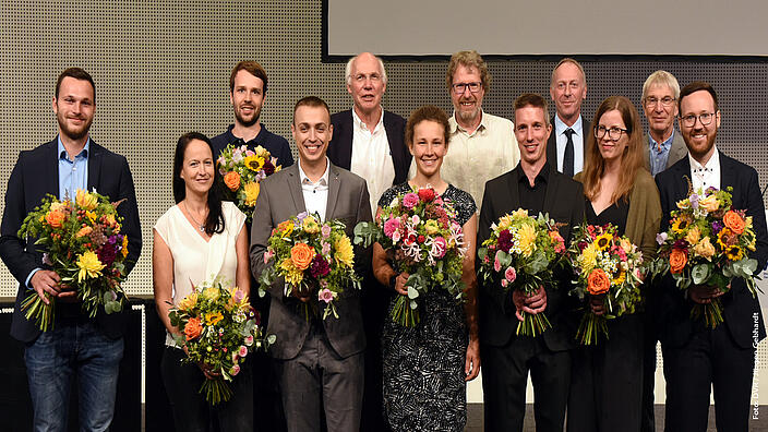 Gruppenbild der Preisträger:innen des DVR-Förderpreises: Michael Ostermaier, Ina Papen, Felix Englert, Robin Arlt, Dr. Torsten Kunz, Wiebke Mros, Prof. Rüdiger Trimpop, Christian Graetz, Kay Schulte, Sophia Hagl, Kevin Andrew Harkin