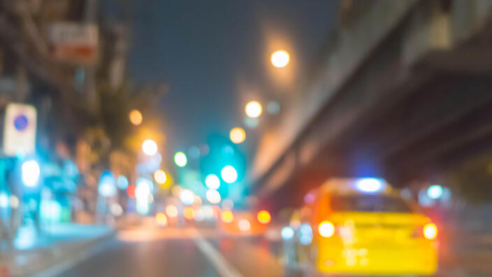 Motion blur car on road at night