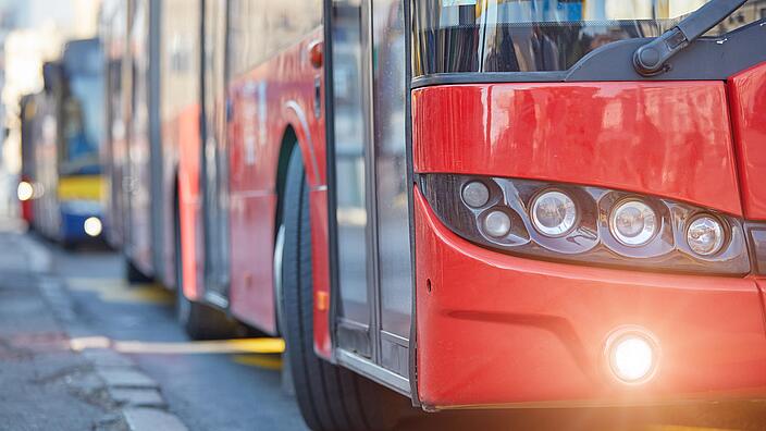 Public transportation / bus in urban surroundings on the street.