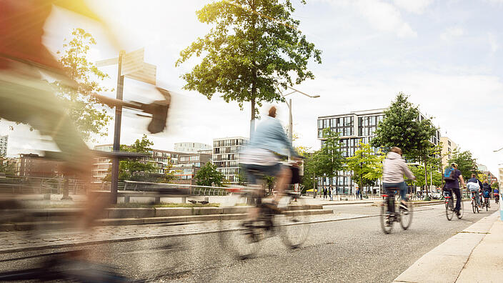 A group of moving cyclists in the city