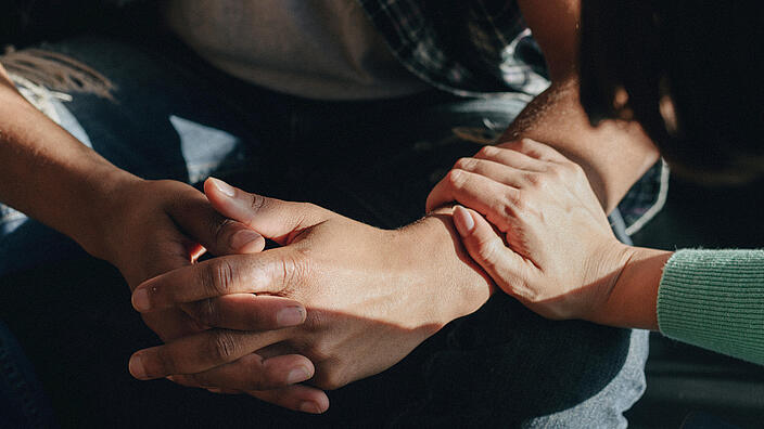  Woman consoling a man